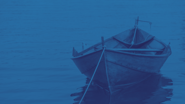 A row boat with a blue tone matte overlay